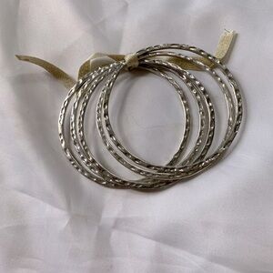 Set of 5 silver bangles